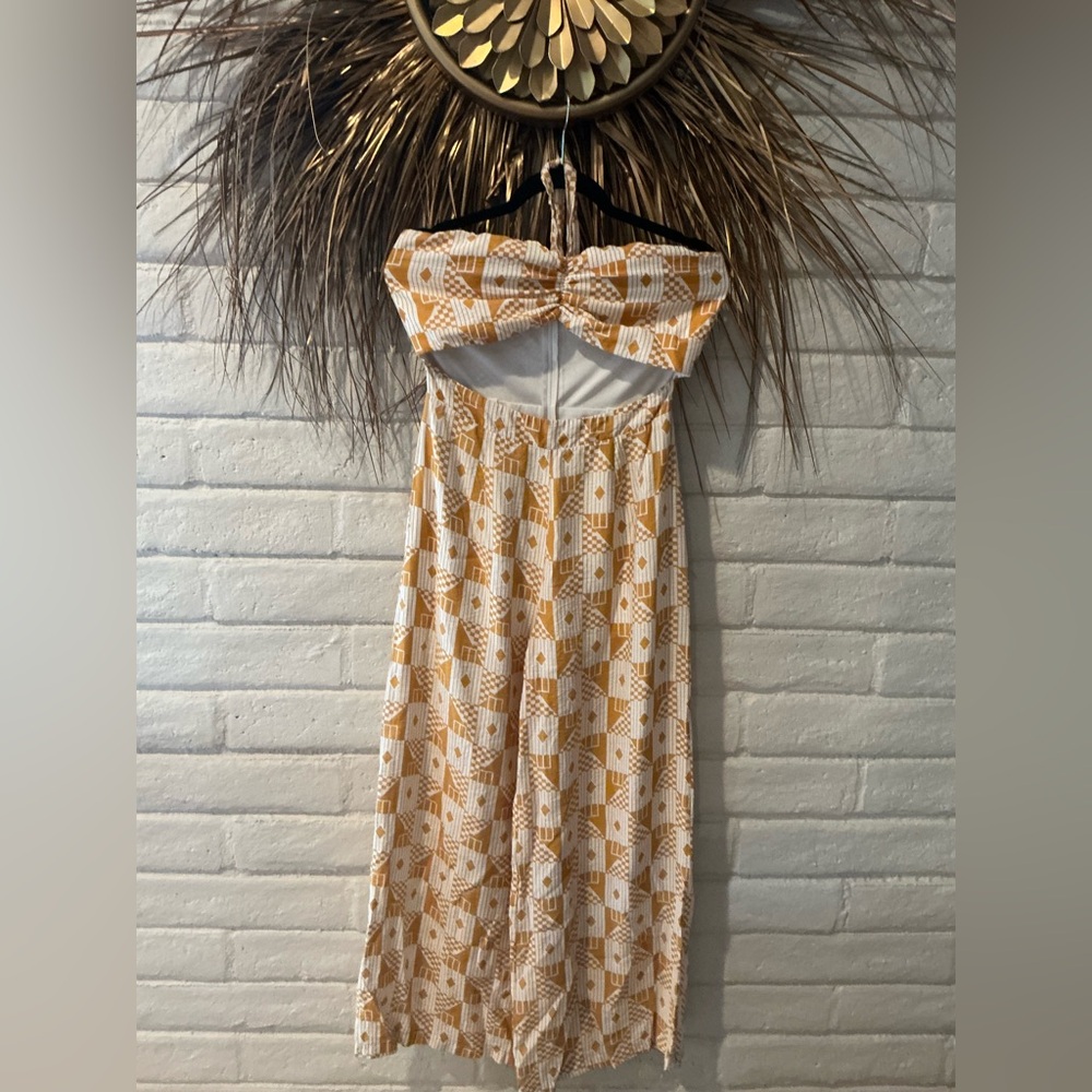 The SANG Mustard Cut-Out Geometric Print Jumpsuit with Halter Tie
